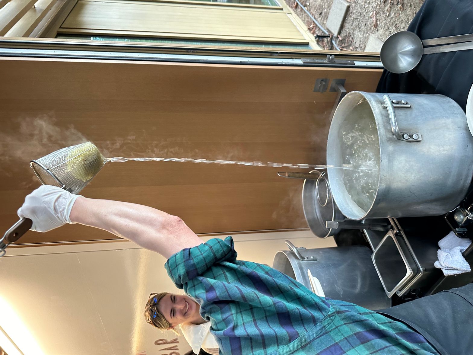 Guest selecting from yogurt bar